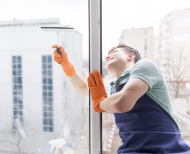 man-cleaning-windows