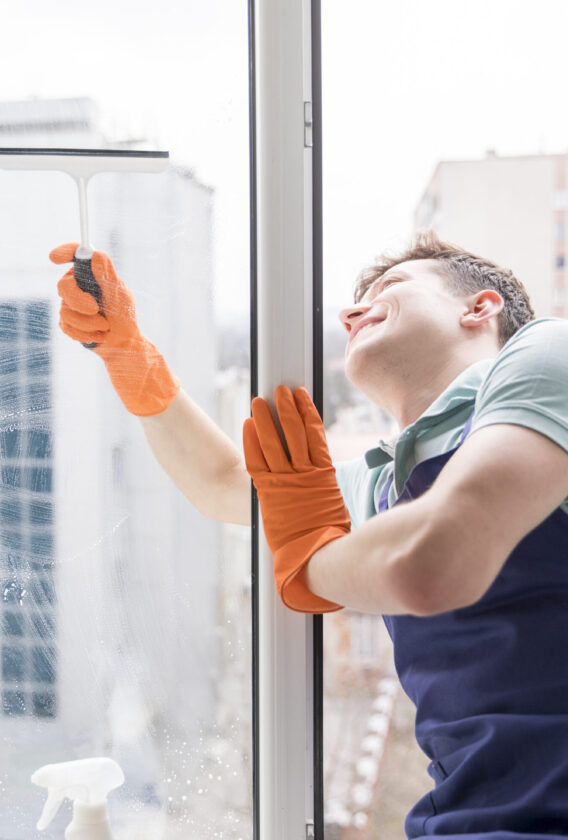 man-cleaning-windows